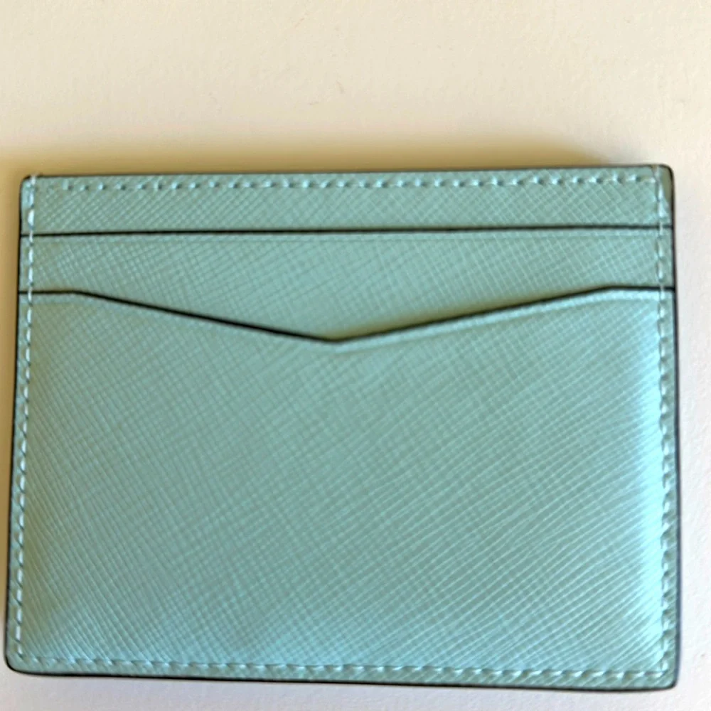 New Kate Spade Leather Blue Glow Card Holder with Gold Logo.